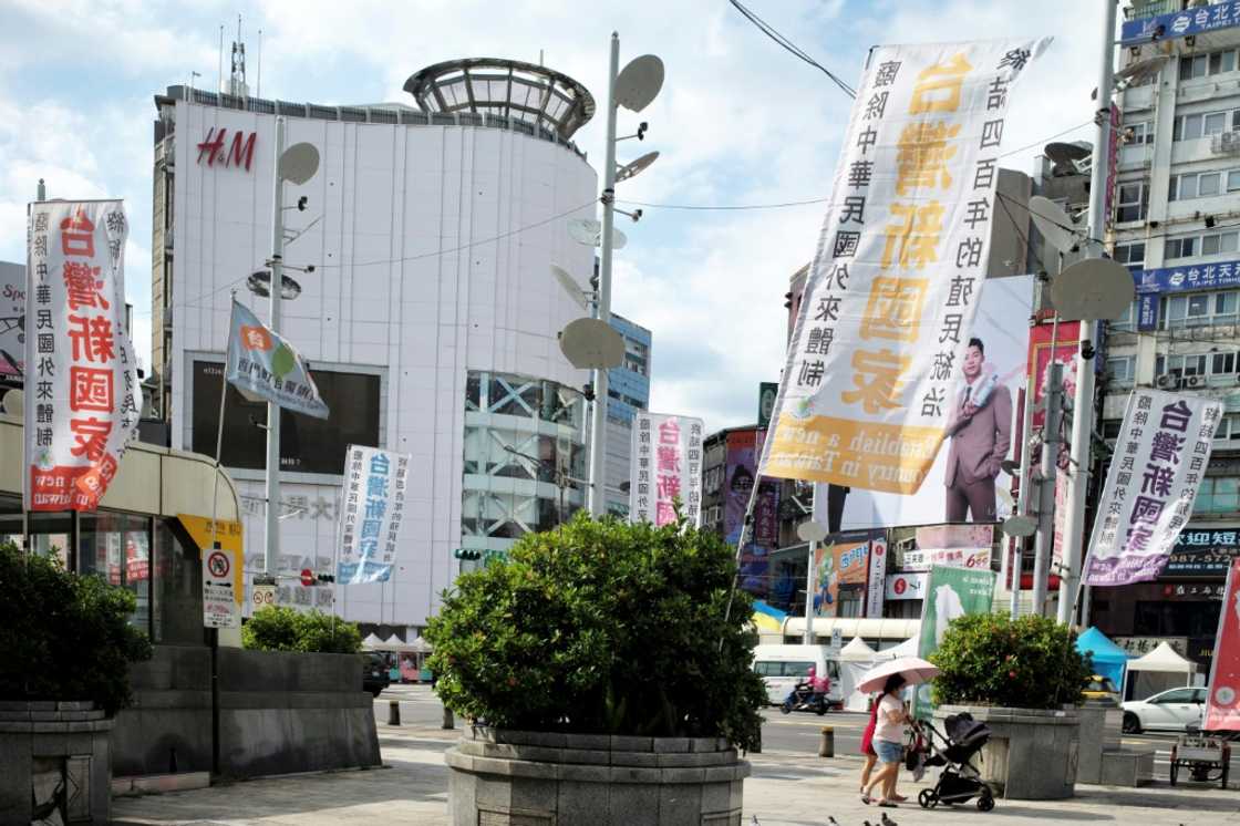 Pro-Taiwan independence flags fly in Taipei. Taiwan has remained defiant throughout days of exercises by Beijing and is due to begin its own live-fire drills on Tuesday