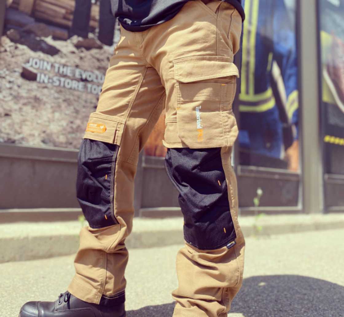 A man wearing work wear pants