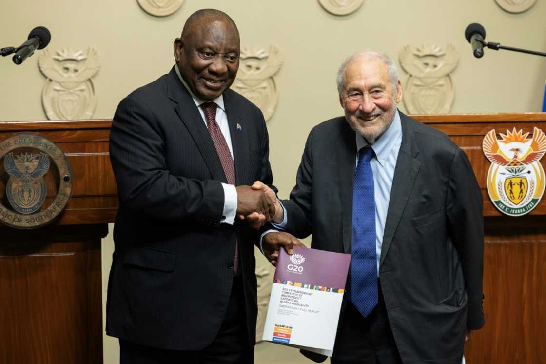 Leading economist Joseph Stiglitz handed the report on global inequality to President Cyril Ramaphosa Leading economist Joseph Stiglitz handed the report on global inequality to President Cyril Ramaphosa