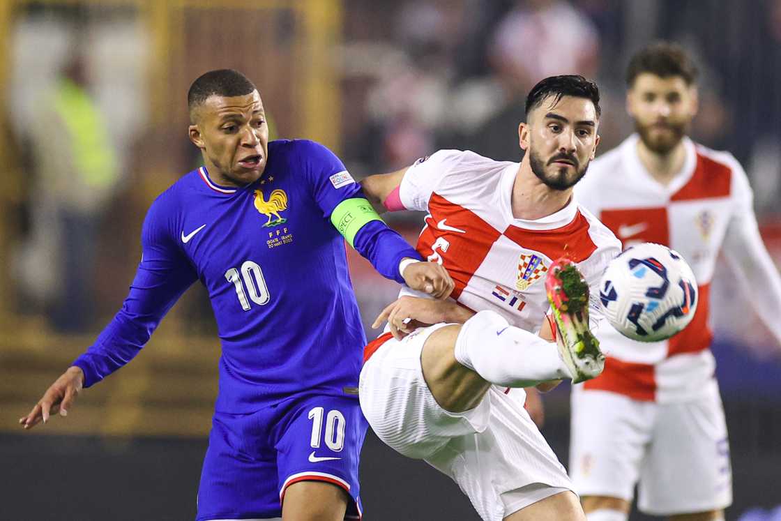 Josip Sutalo of Croatia is challenged by Kylian Mbappe of France during the UEFA Nations League quarterfinal leg one match between Croatia and France at Stadion Poljud on March 20, 2025 in Split, Croatia Josip Sutalo of Croatia is challenged by Kylian Mbappe of France during the UEFA Nations League quarterfinal leg one match between Croatia and France at Stadion Poljud on March 20, 2025 in Split, Croatia