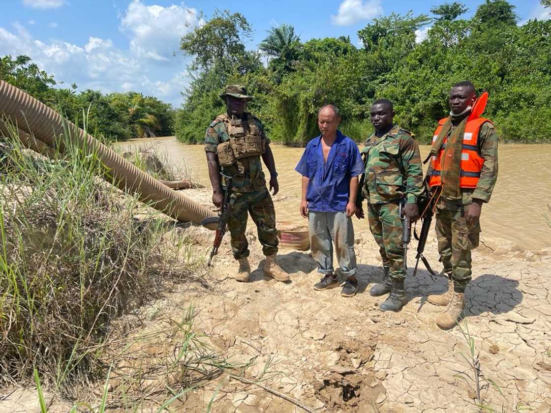 See what you have done to our river, can you drink this? - Military queries illegal Chinese gold miner