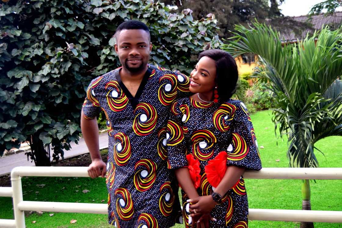Couple in African Attire standing.