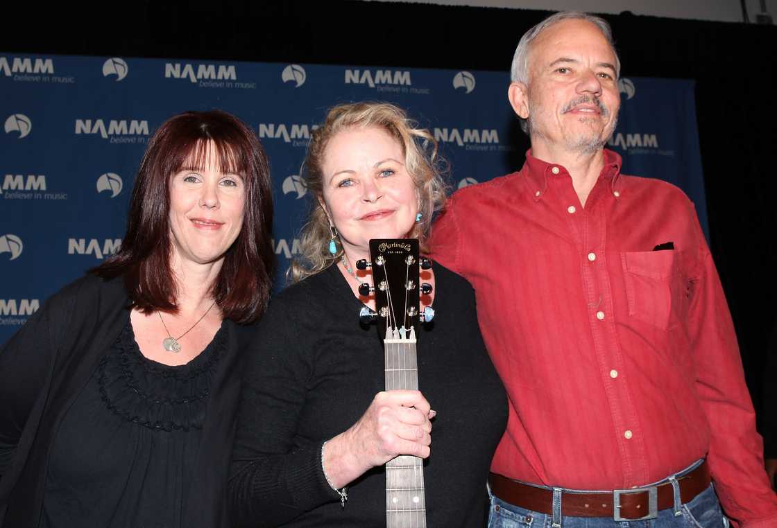 Mama Cass Elliot's daughter, Owen Elliot-Kugell, musical icon Michelle Phillips, and John Phillips' son Jeffrey Phillips at the Anaheim Convention Centre Mama Cass Elliot's daughter, Owen Elliot-Kugell, musical icon Michelle Phillips, and John Phillips' son Jeffrey Phillips at the Anaheim Convention Centre