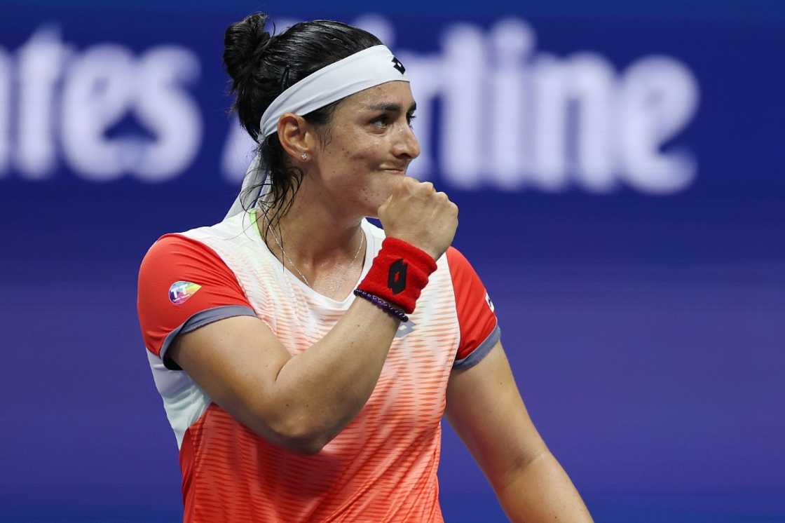 Ons Jabeur of Tunisia celebrates after defeating Ajla Tomljanovic to reach the US Open semi-finals on Tuesday