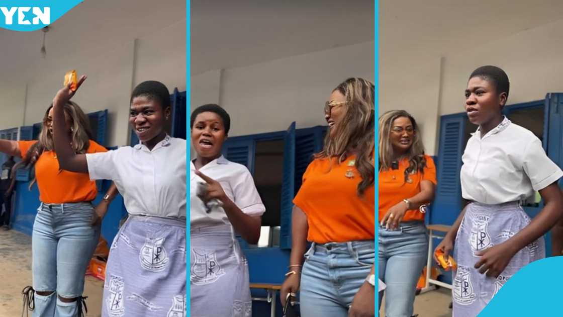 Actress Nana Ama McBrown dances with students of her alma mater POPGISS in Kumasi