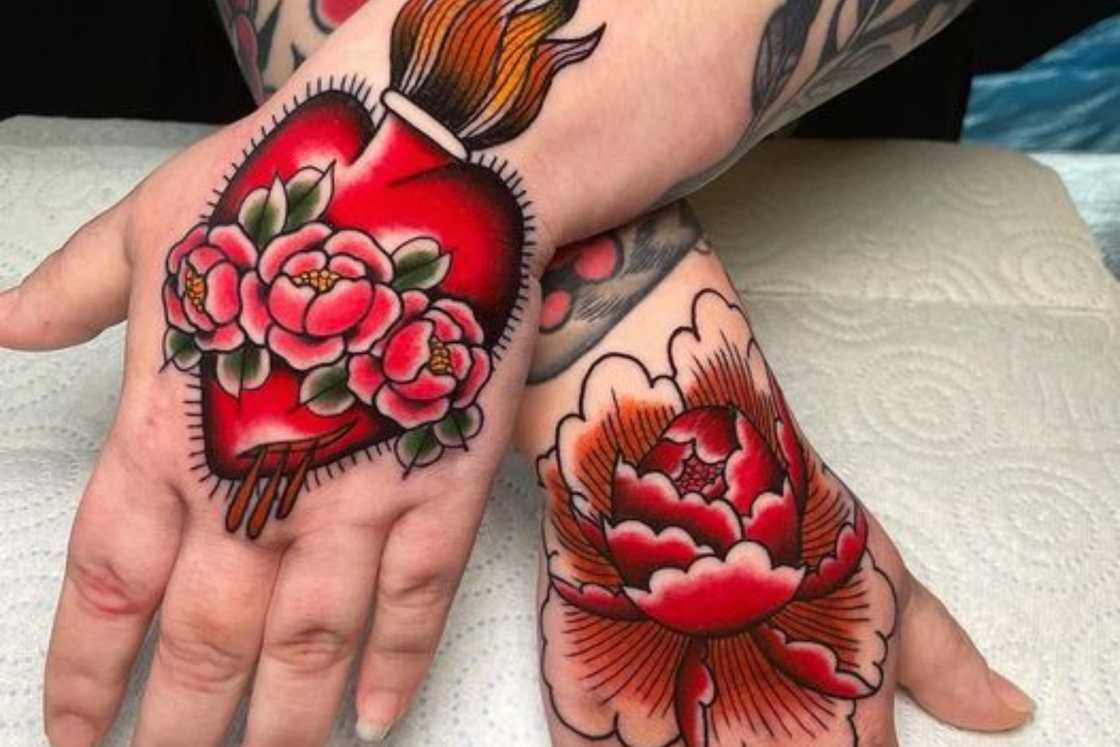 Sacred heart and rose flowers tattoo