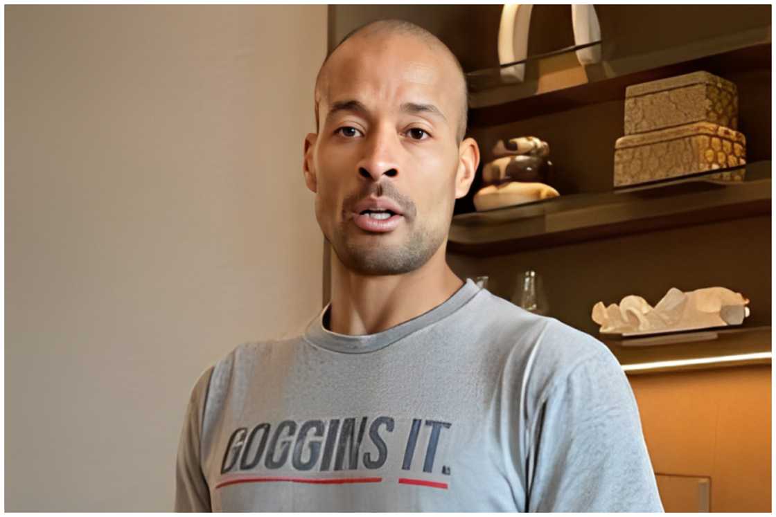 David Goggins in a grey T-shirt. David Goggins in a grey T-shirt.