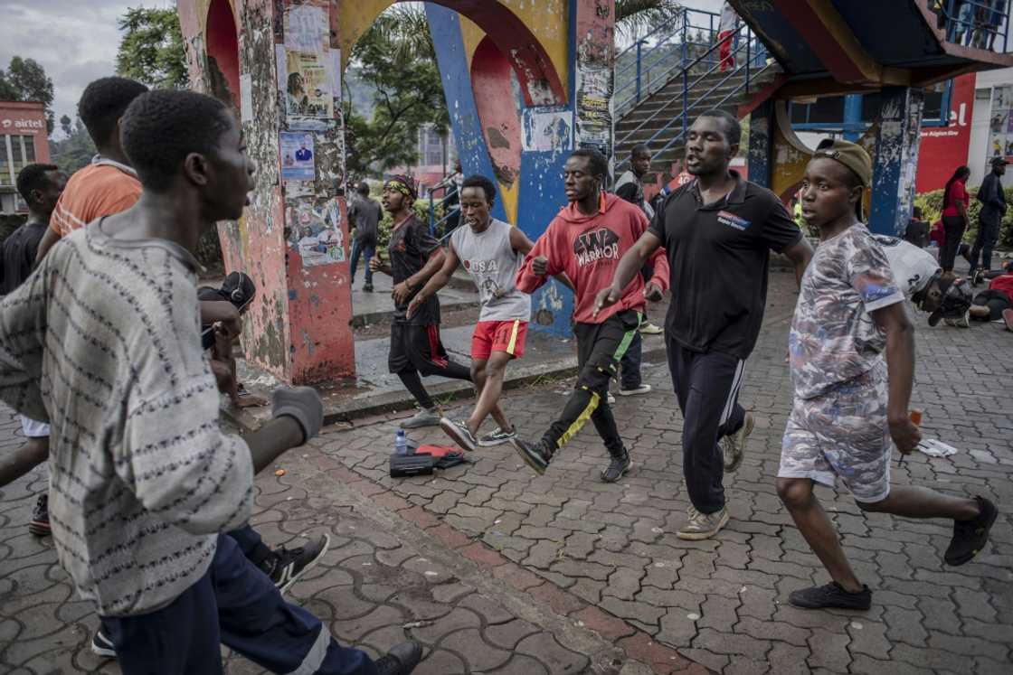 Joseph Katwaza, a 60-year-old exercising at a roundabout at the heart of Goma, said people 'want to continue with life' Joseph Katwaza, a 60-year-old exercising at a roundabout at the heart of Goma, said people 'want to continue with life'