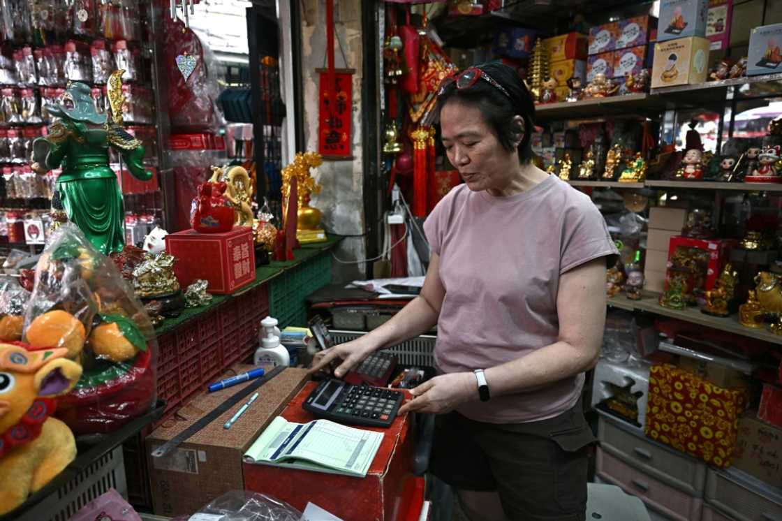 Thitinan Suntisubpool, co-owner of a shop in Bangkok's Chinatown, said she loves how durable her big calculator is