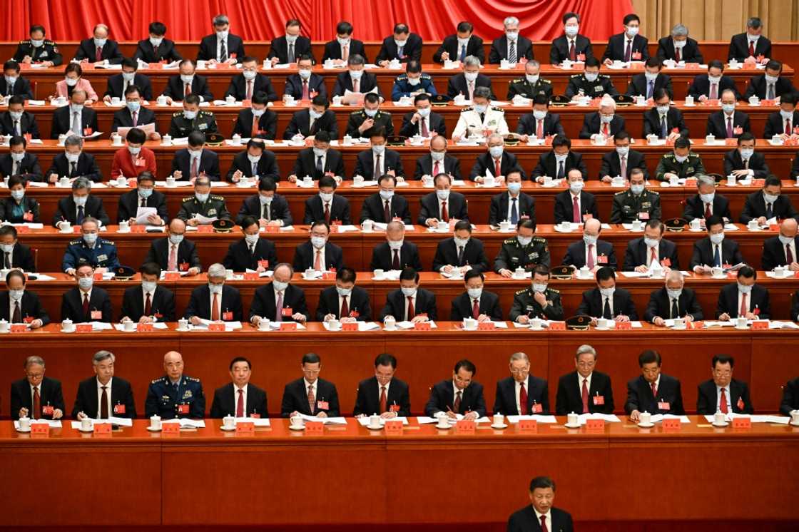 China's President Xi Jinping (front right) speaks during the opening session of the 20th Chinese Communist Party's Congress at the Great Hall of the People in Beijing China's President Xi Jinping (front right) speaks during the opening session of the 20th Chinese Communist Party's Congress at the Great Hall of the People in Beijing