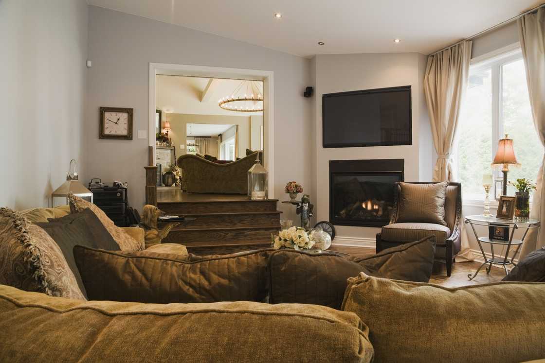 Awkward living room layout with a fireplace Awkward living room layout with a fireplace