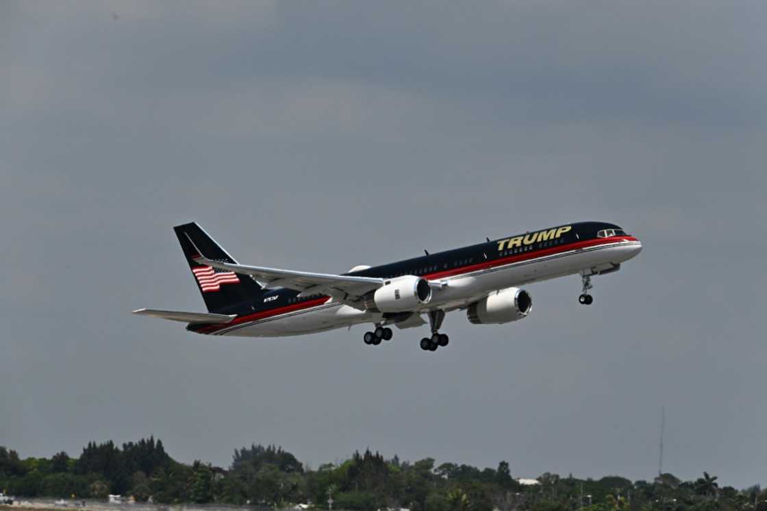 The plane of former US president Donald Trump takes off from Palm Beach International Airport in West Palm Beach, Florida The plane of former US president Donald Trump takes off from Palm Beach International Airport in West Palm Beach, Florida