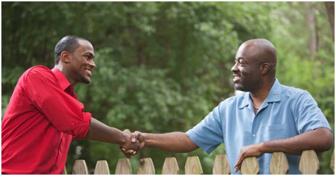 A man meets his potential new neighbour