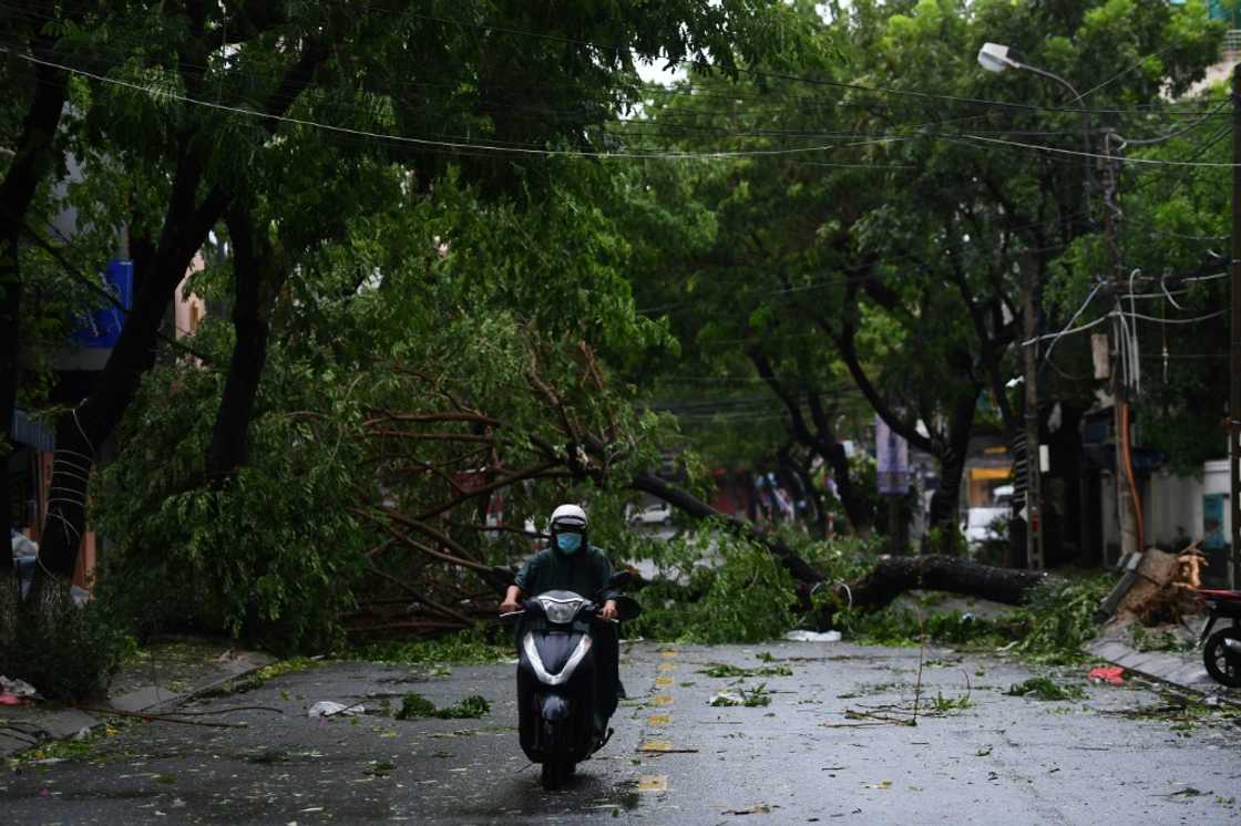 Residents rushed to clean up the debris early Wednesday, with some shops already open and tourists walking the streets