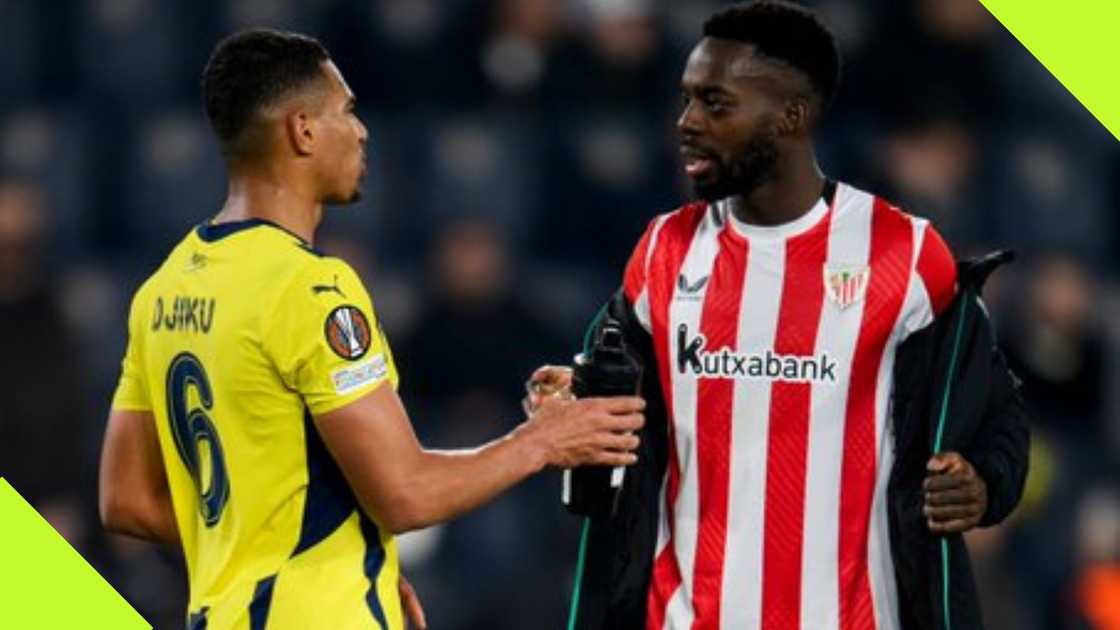 Inaki Williams meets Alexander Djiku after Europa League game.