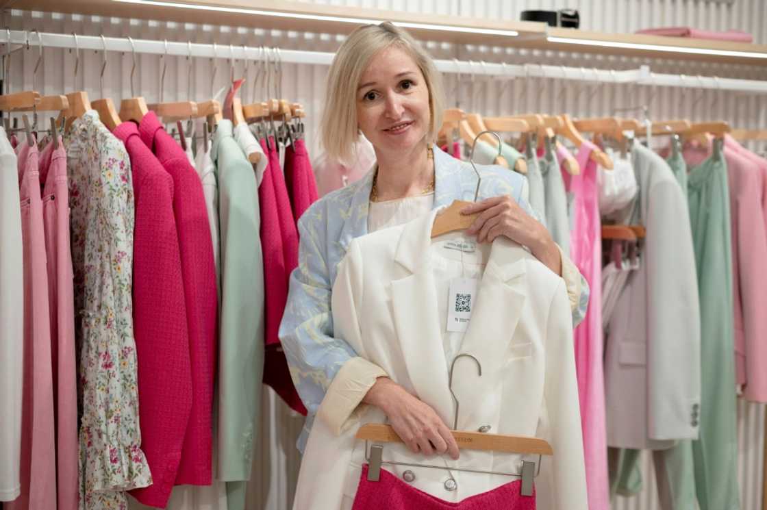 Clothing consultant Stanislava Nazhmitdinova at a multi-brand clothing store at a Moscow shopping centre Clothing consultant Stanislava Nazhmitdinova at a multi-brand clothing store at a Moscow shopping centre