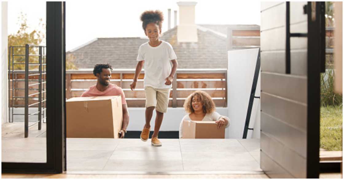 A family moves into their new home