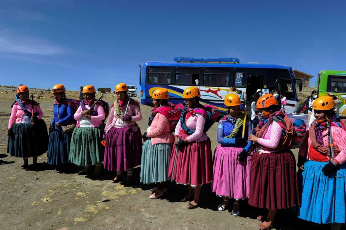 The Aymara indigenous women members of the Climbing Cholitas of Bolivia Warmis make a colourful spectacle as they arrive at the base of the 6.088-metre Huayna Potosi mountain The Aymara indigenous women members of the Climbing Cholitas of Bolivia Warmis make a colourful spectacle as they arrive at the base of the 6.088-metre Huayna Potosi mountain