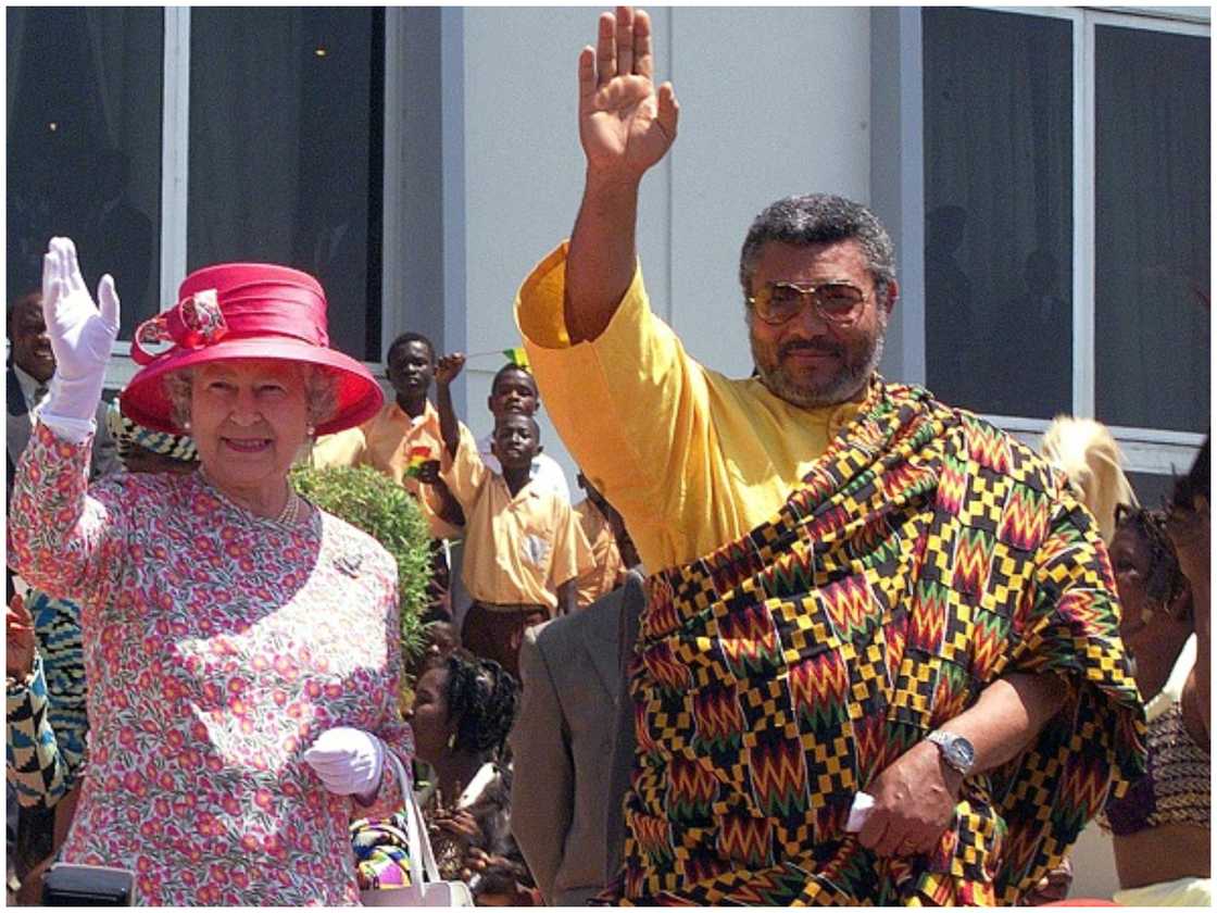 Queen Elizabeth and Rawlings wave shortly after the Queen addresses Parliament. Queen Elizabeth and Rawlings wave shortly after the Queen addresses Parliament.
