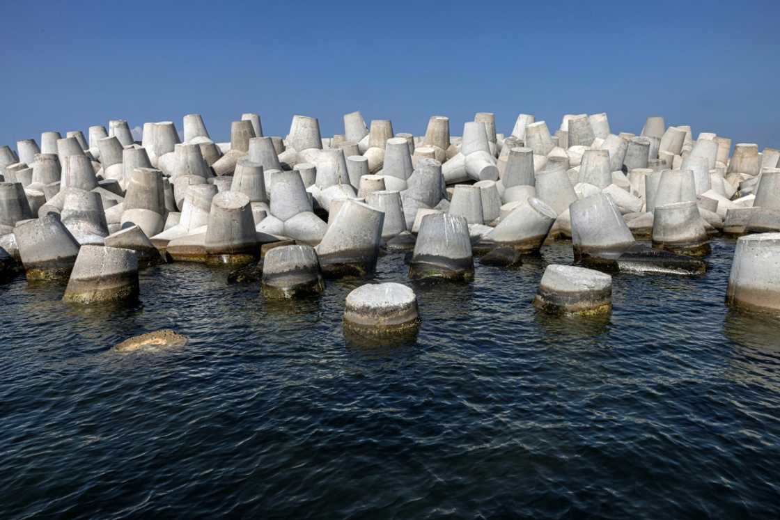Losing battle? A barrier to hold back the Mediterranean in Egypt's threatened second city, Alexandria Losing battle? A barrier to hold back the Mediterranean in Egypt's threatened second city, Alexandria