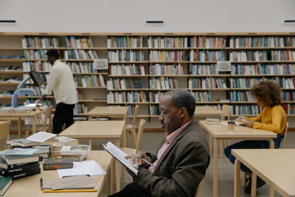 People studying inside a library
