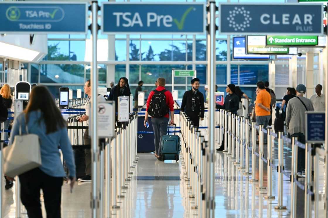 The funding halt means some 13,300 US air traffic controllers and thousands of other essential aviation safety officials must work without pay The funding halt means some 13,300 US air traffic controllers and thousands of other essential aviation safety officials must work without pay