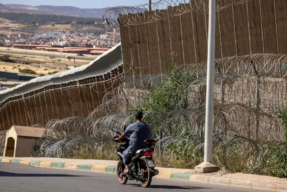 At least 23 people died last week when around 2,000 migrants, mostly from sub-Saharan Africa, tried to break through the fence from Morocco into the tiny Spanish enclave of Melilla At least 23 people died last week when around 2,000 migrants, mostly from sub-Saharan Africa, tried to break through the fence from Morocco into the tiny Spanish enclave of Melilla