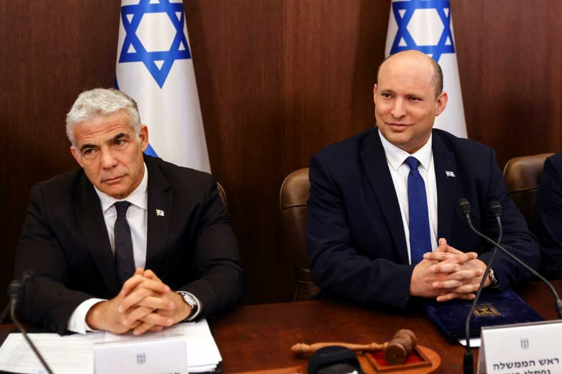 Israeli Prime Minister Naftali Bennett is expected to hand over power to Foreign Minister Yair Lapid after parliament dissolves itself