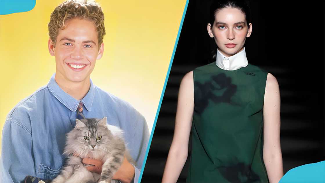 Paul holding a cat and his daughter walking on the runway Paul holding a cat and his daughter walking on the runway