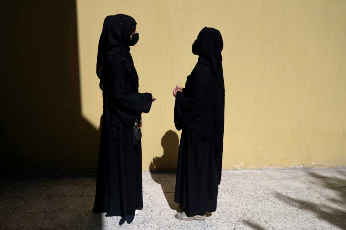 Sisters Sarah (L), 20, and Fatima, 19, were months away from sitting university entrance exams when their school was shuttered