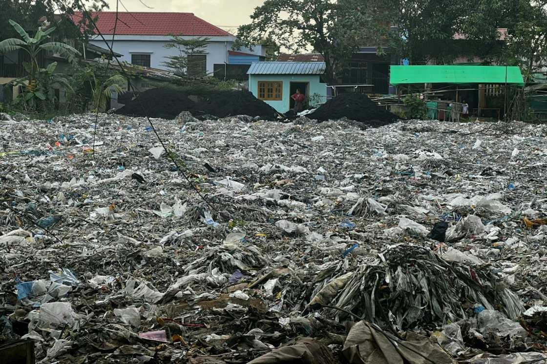 For several years sites across Shwepyithar township have been filling up with trash