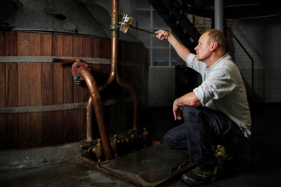 Brewer Jean-Pierre Van Roy checking the production at Brasserie Cantillon Brewer Jean-Pierre Van Roy checking the production at Brasserie Cantillon