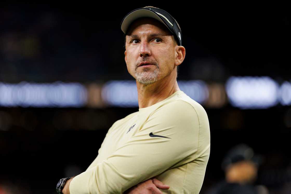 Dennis Allen looks on during pregame warmups before an NFL preseason football game