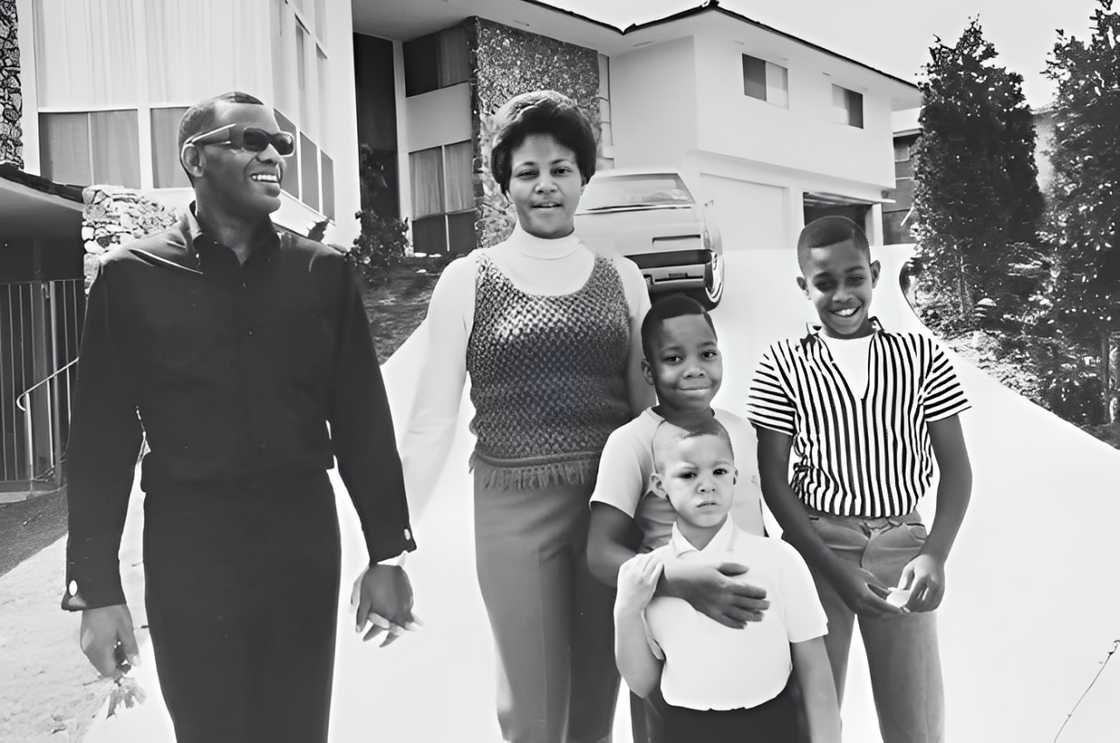 Family portrait of Ray Charles standing in the driveway of his spacious Los Angeles home with his wife Della and their three sons—Robert, 5, David, 7, and Ray Jr., 11. Family portrait of Ray Charles standing in the driveway of his spacious Los Angeles home with his wife Della and their three sons—Robert, 5, David, 7, and Ray Jr., 11.
