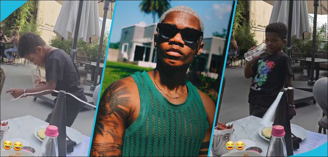 KiDi and his son Zane at a restaurnat KiDi and his son Zane at a restaurnat