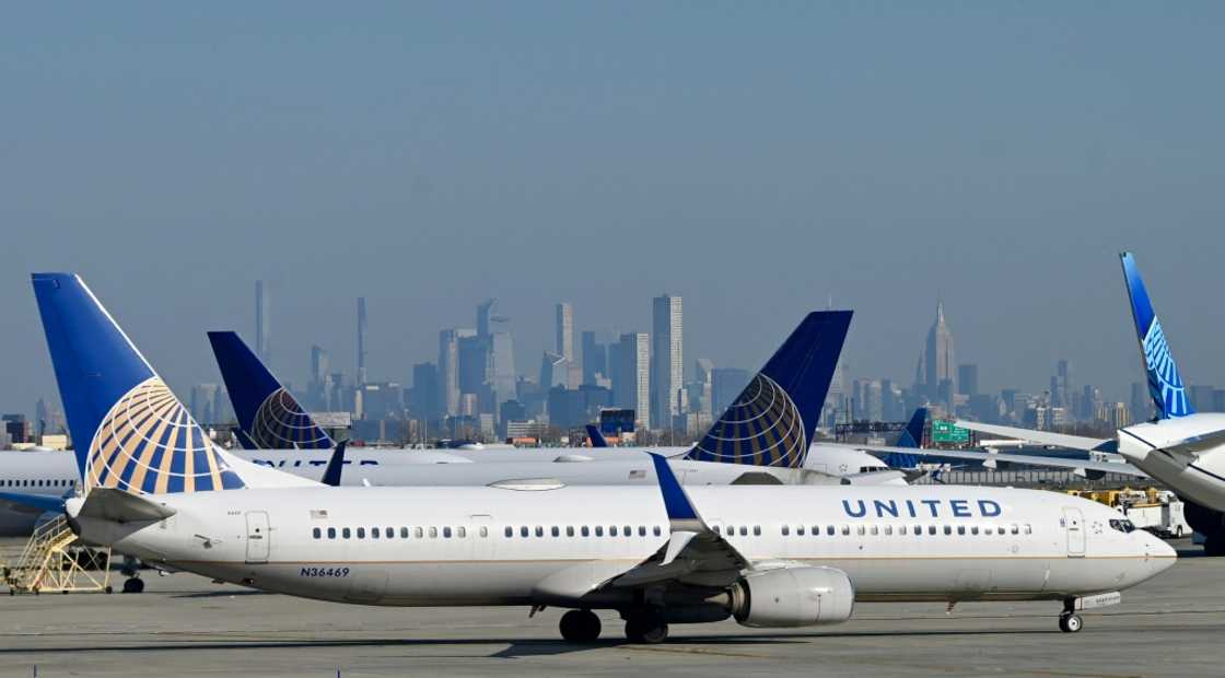 A file picture of planes at Newark airport in New Jersey -- the United States Federal Aviation Authority said January 11 it was working to its flight information system, with flight operations across the country paused A file picture of planes at Newark airport in New Jersey -- the United States Federal Aviation Authority said January 11 it was working to its flight information system, with flight operations across the country paused