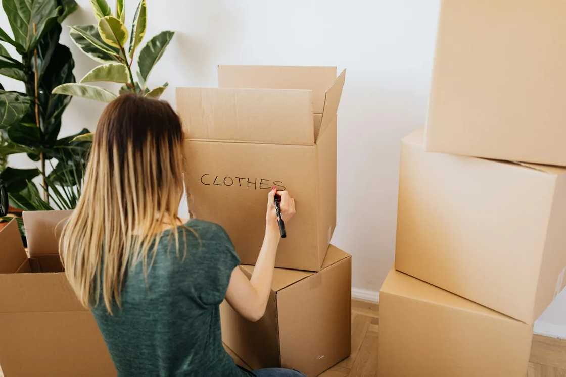 A woman with boxes