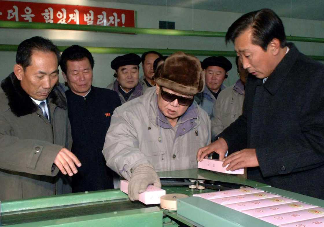 Late North Korean leader Kim Jong-Il visiting a tobacco factory in 2010 Late North Korean leader Kim Jong-Il visiting a tobacco factory in 2010
