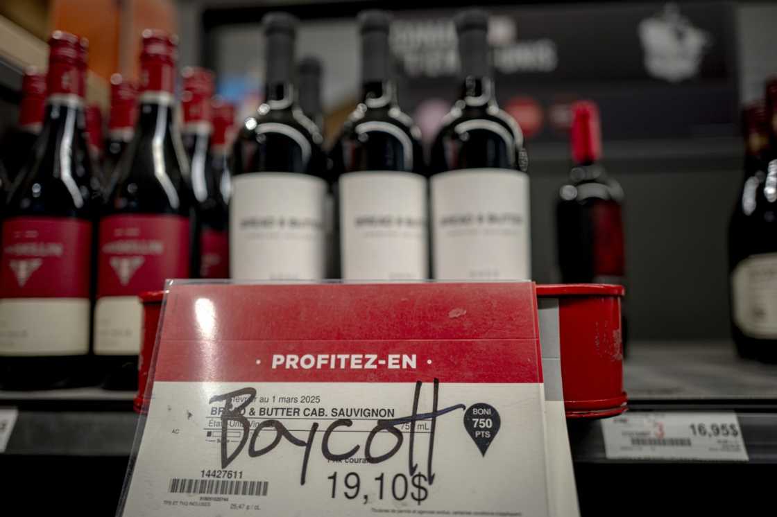Graffiti calling to boycott American wine is seen at a liquor store in Montreal, Canada, on February 3, 2025 Graffiti calling to boycott American wine is seen at a liquor store in Montreal, Canada, on February 3, 2025