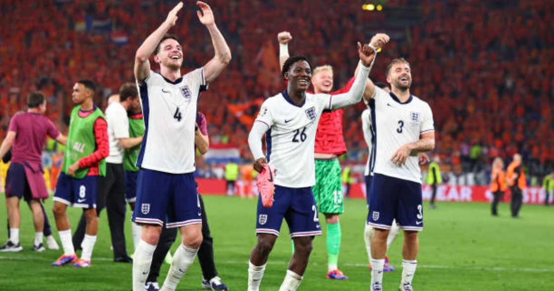 Kobbie Mainoo celebrates after England's win.