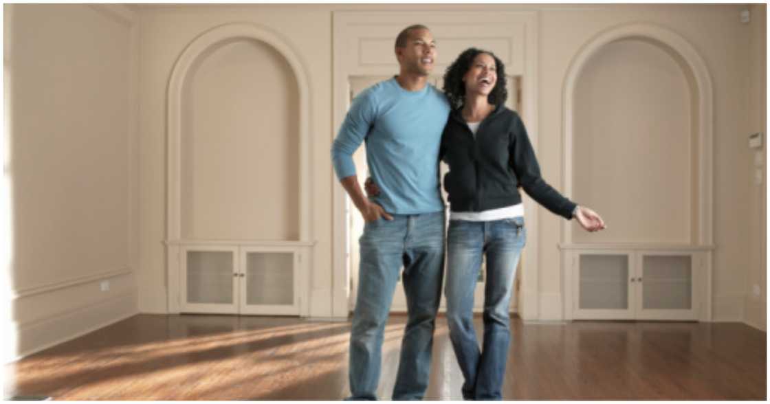 A couple buys their first home A couple buys their first home