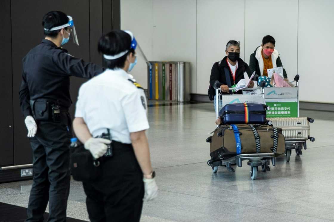 Passengers arriving in Hong Kong now have to spend three days in a quarantine hotel, cut from seven as the city eases some Covid restrictions Passengers arriving in Hong Kong now have to spend three days in a quarantine hotel, cut from seven as the city eases some Covid restrictions