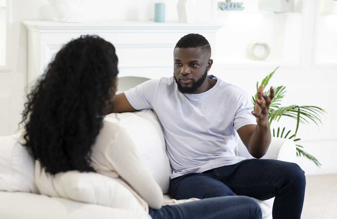 A man and woman taking