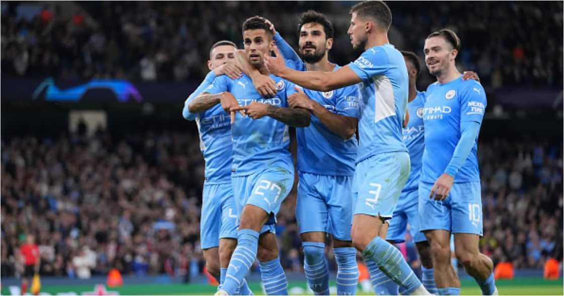 Joao Cancelo celebrates with teammates after scoring their side's fifth goal during the UEFA Champions League group A match against Leipzig (Photo by Matt McNulty - Manchester City/Manchester City FC via Getty Images) Joao Cancelo celebrates with teammates after scoring their side's fifth goal during the UEFA Champions League group A match against Leipzig (Photo by Matt McNulty - Manchester City/Manchester City FC via Getty Images)
