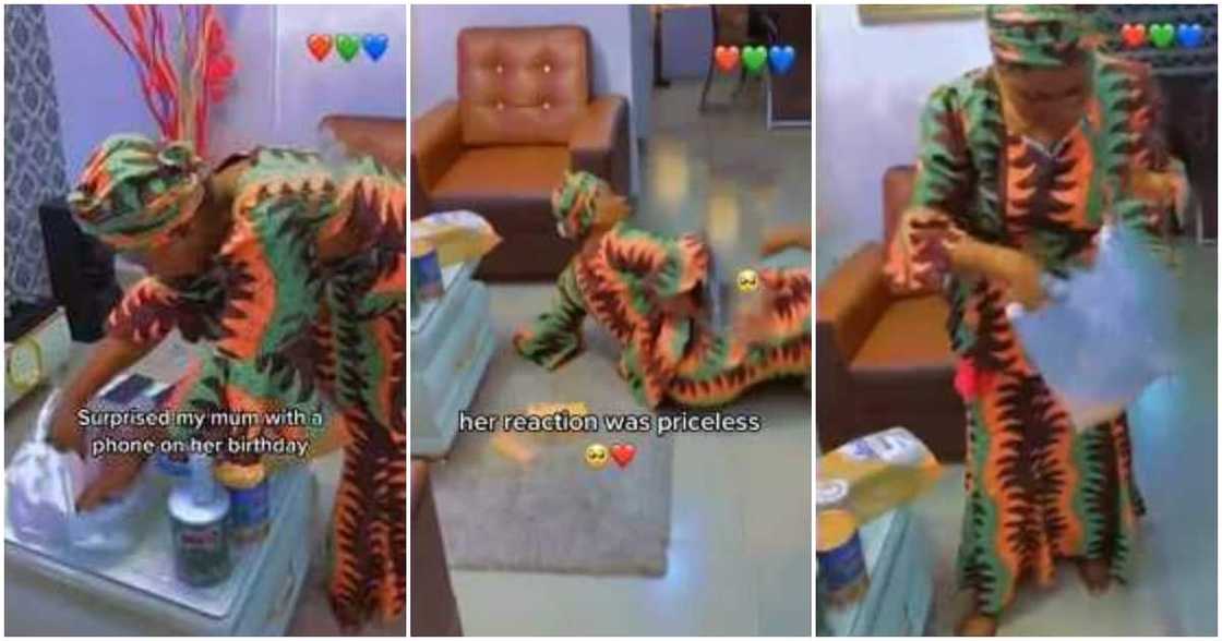 Video shows moment Nigerian mum rolled on floor like a kid after son surprised her with a new phone Video shows moment Nigerian mum rolled on floor like a kid after son surprised her with a new phone