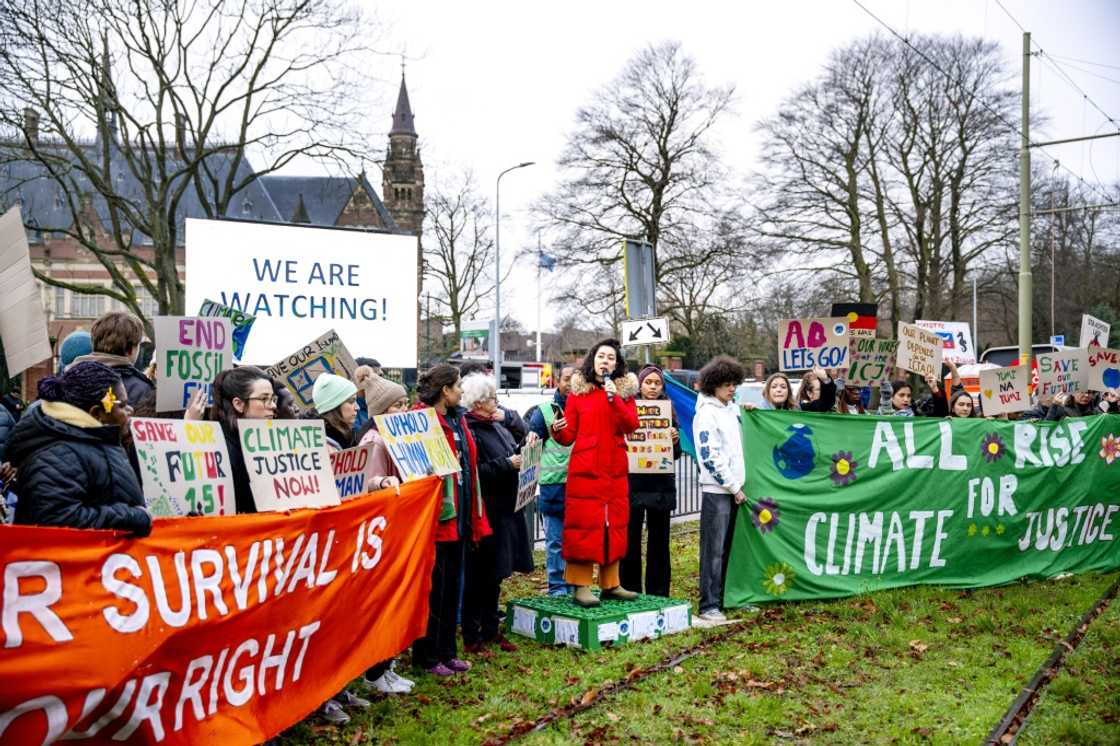 A handful of protesters gathered outside the Peace Palace