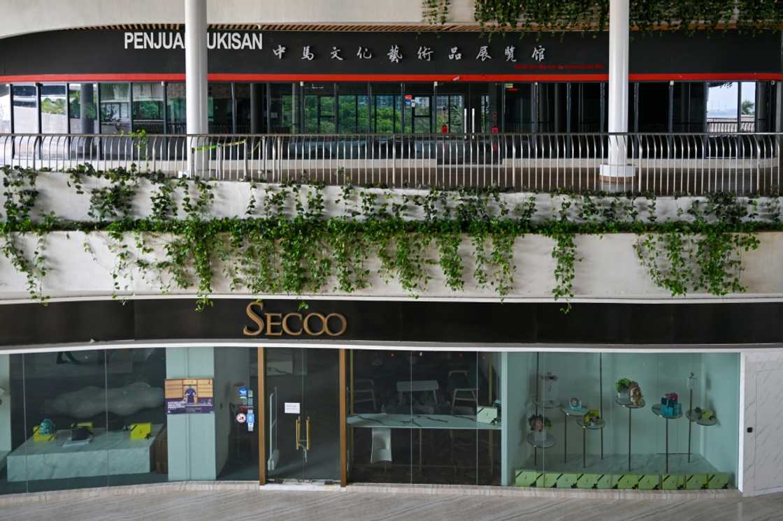 Closed shops in Forest City, as its heavily indebted developer negotiates with creditors to avoid defaulting Closed shops in Forest City, as its heavily indebted developer negotiates with creditors to avoid defaulting