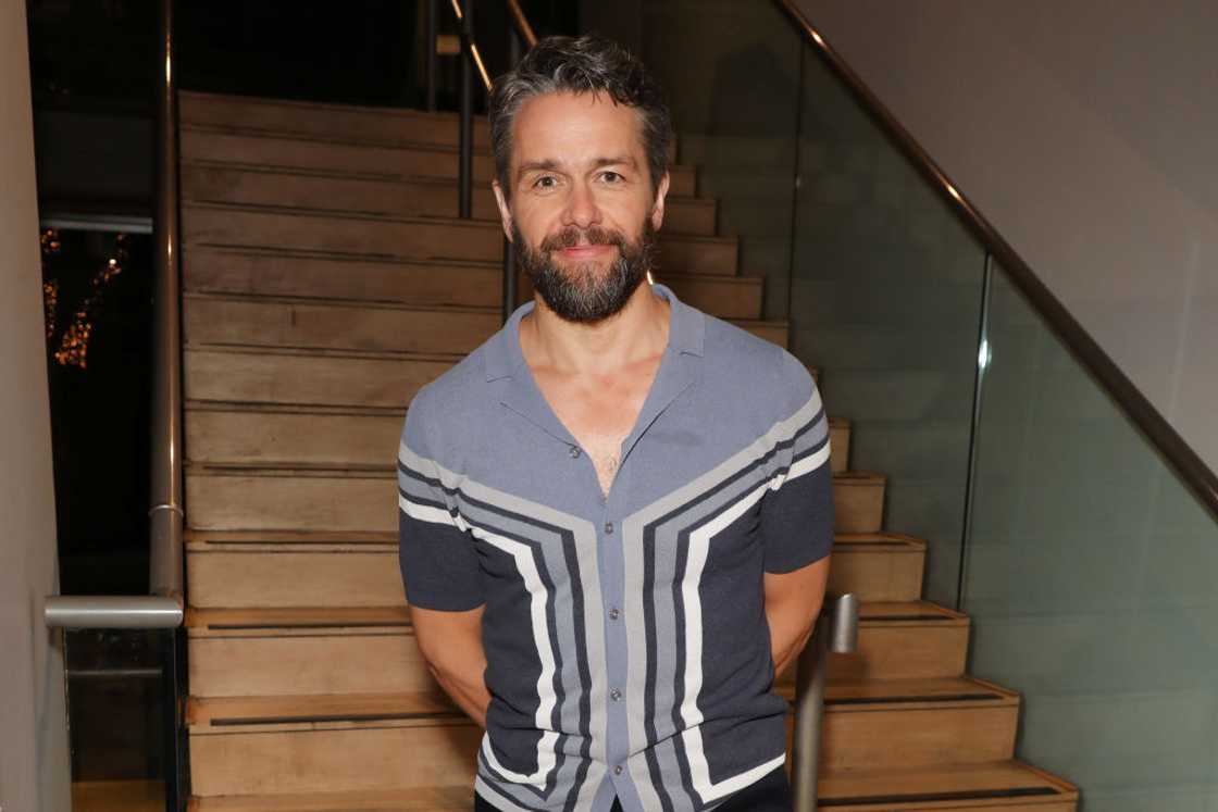Julian Ovenden in a stripped shirt Julian Ovenden in a stripped shirt