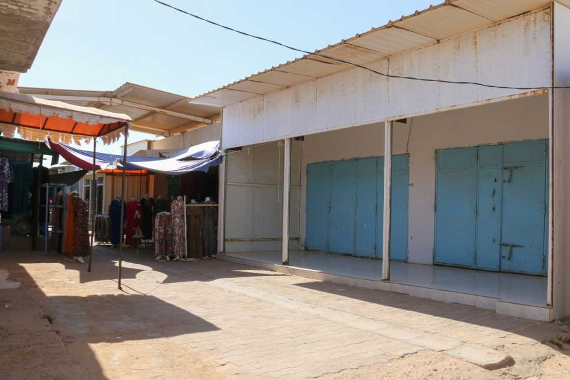 Shops are shuttered at a market in Tunisia's southern town of Ben Guerdane, near the Libyan border Shops are shuttered at a market in Tunisia's southern town of Ben Guerdane, near the Libyan border