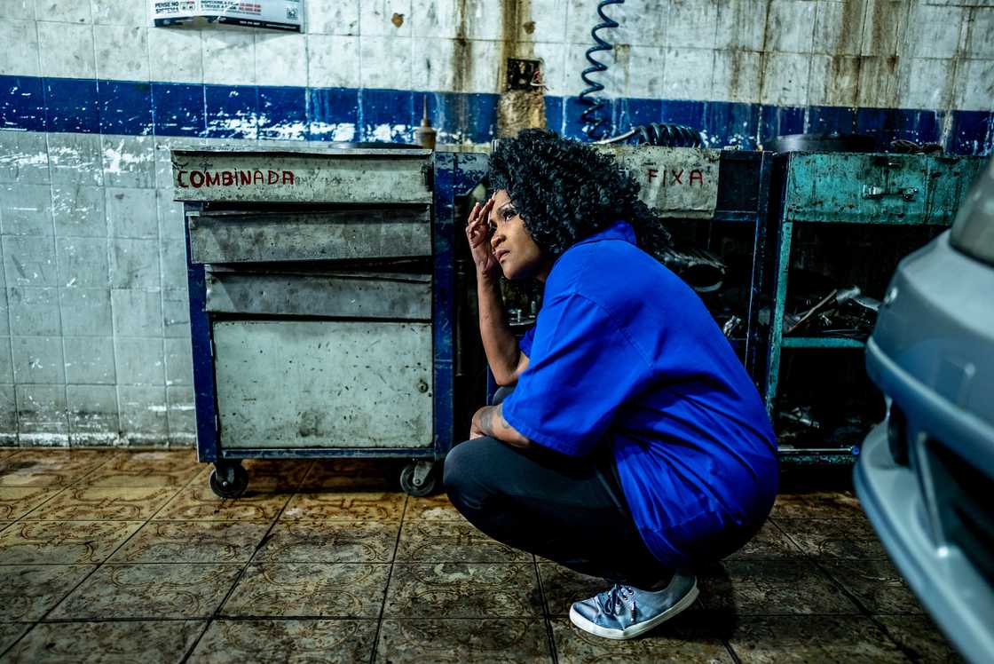 A stressed out female mechanic